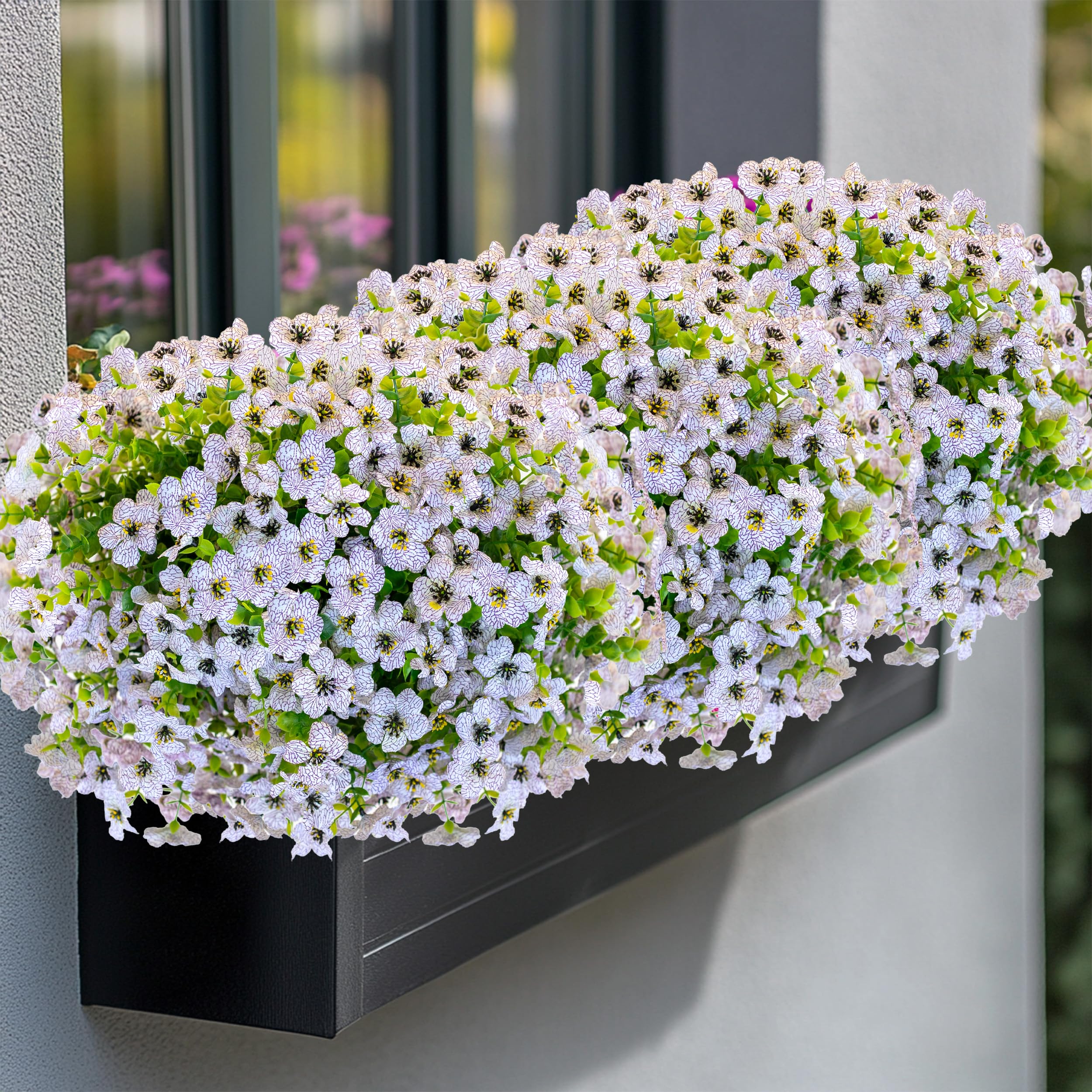 AXYLEX versatile faux plants boost garden ambiance on patios or balconies.