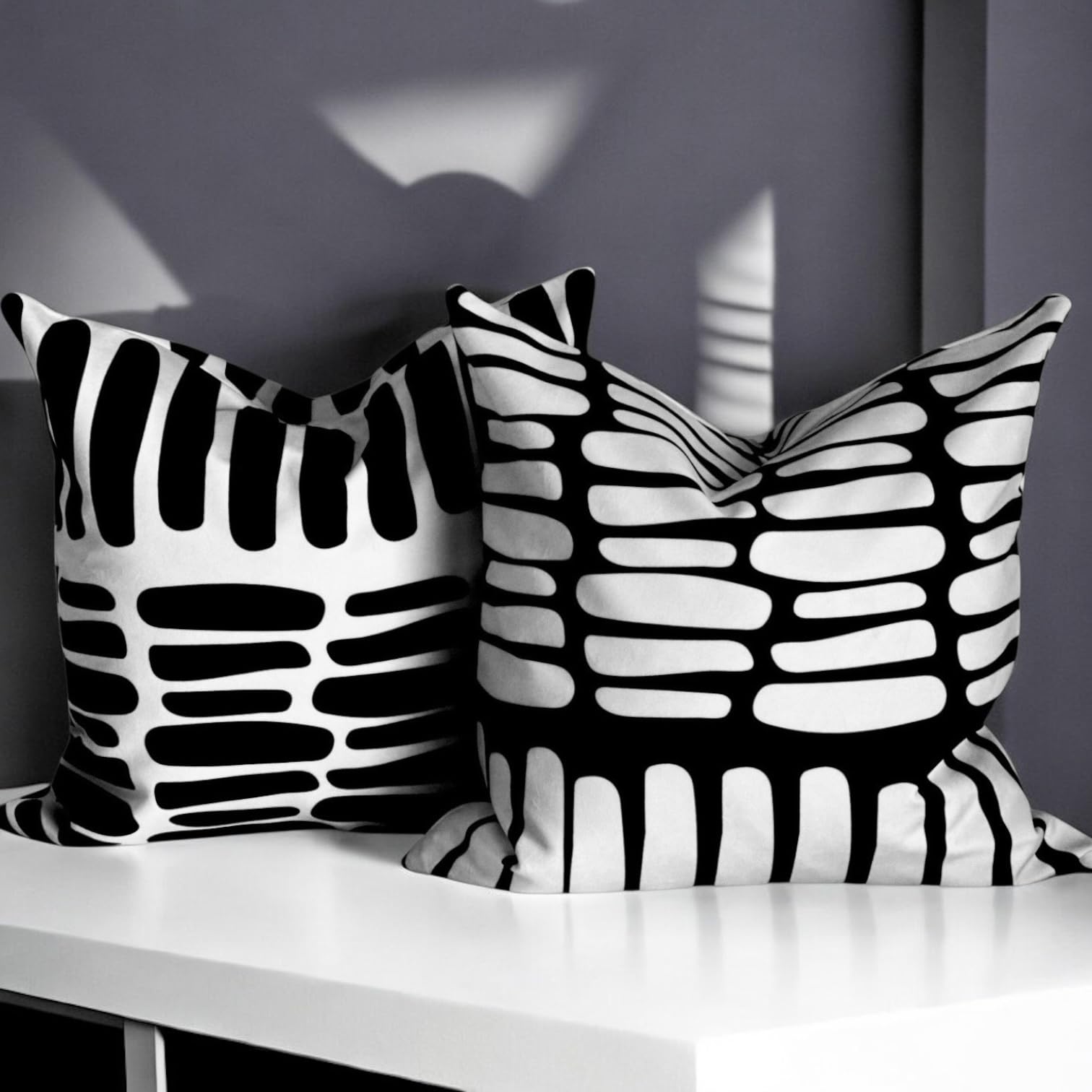 AYAY black and white pillow cover closeup highlights bold contrast and fabric.