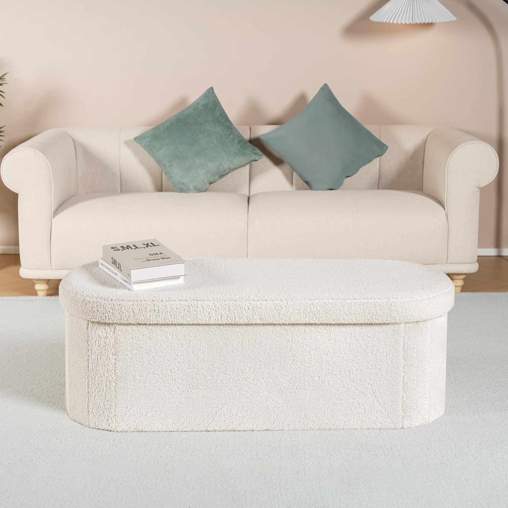 B FSOBEIIALEO oval white ottoman enhances entryway appeal.