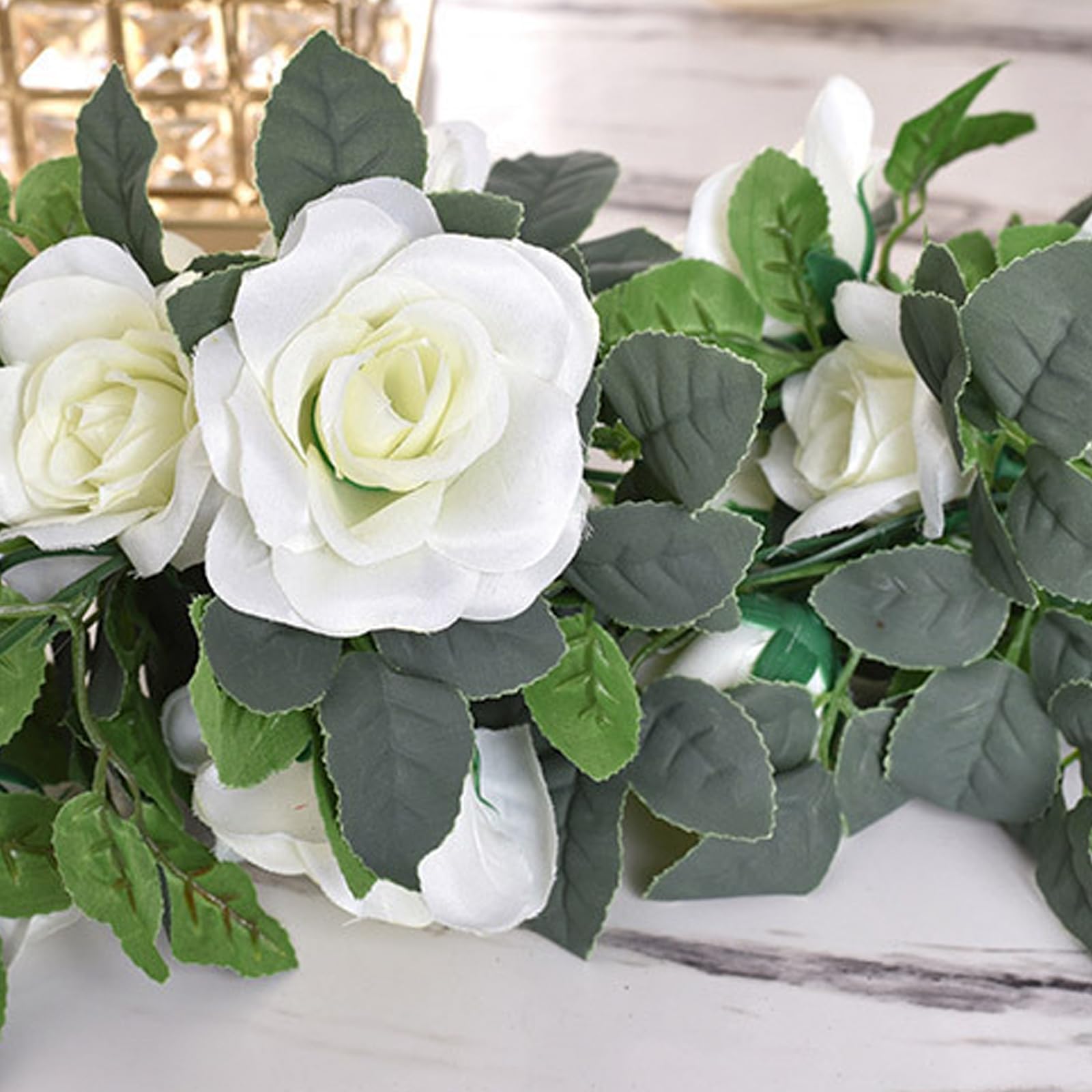 Bacucine artificial rose garland ideal for wedding decor and events.