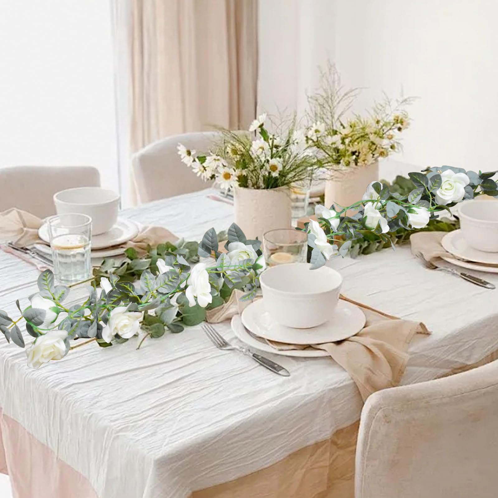 Bacucine floral garland with green leaves for indoor styling.