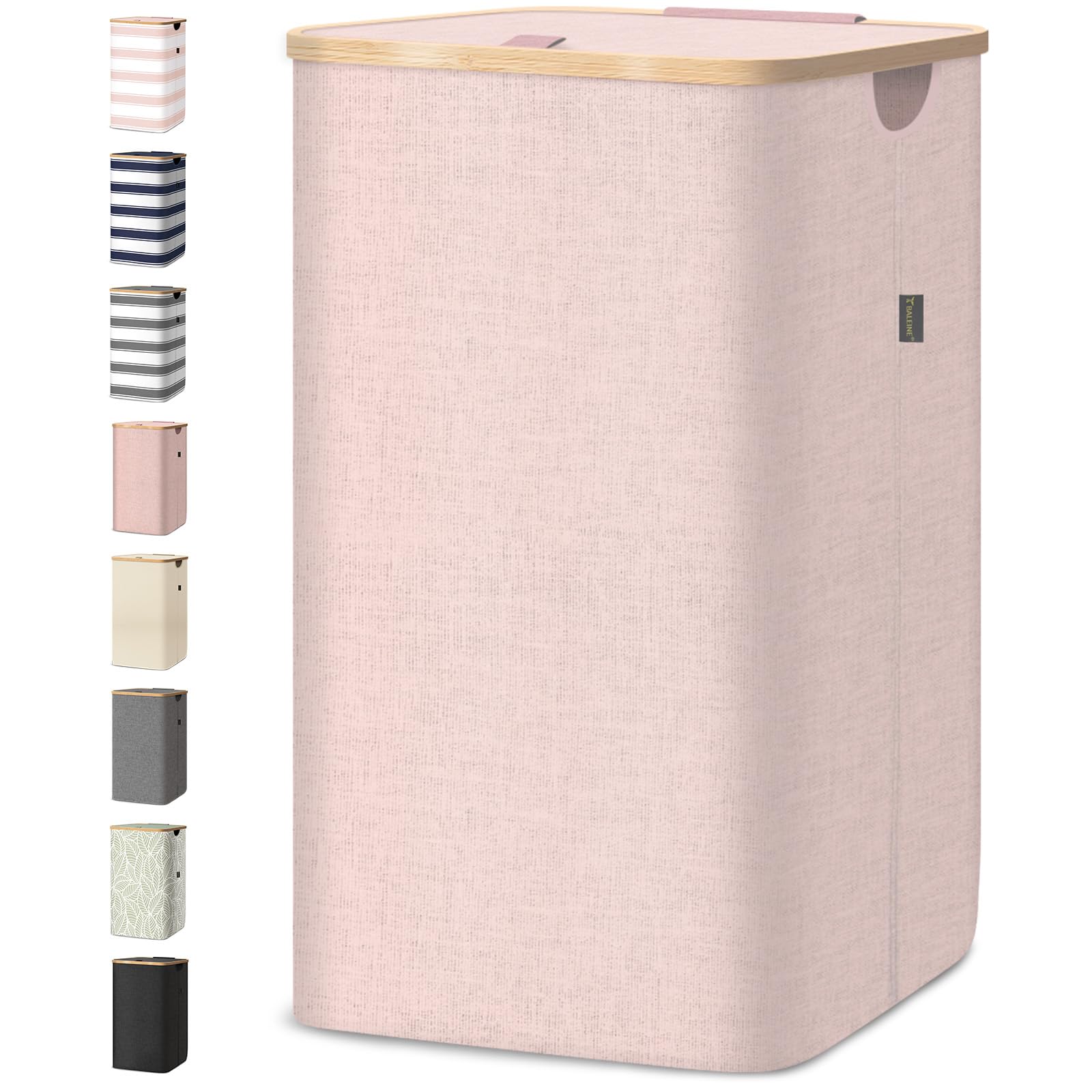 BALEINE laundry hamper with pink lid and bamboo rim keeps laundry tidy.
