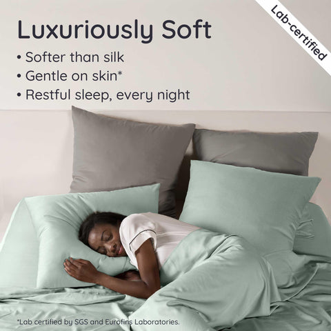 Bambaw elastic corner straps visible for stay-in-place fit