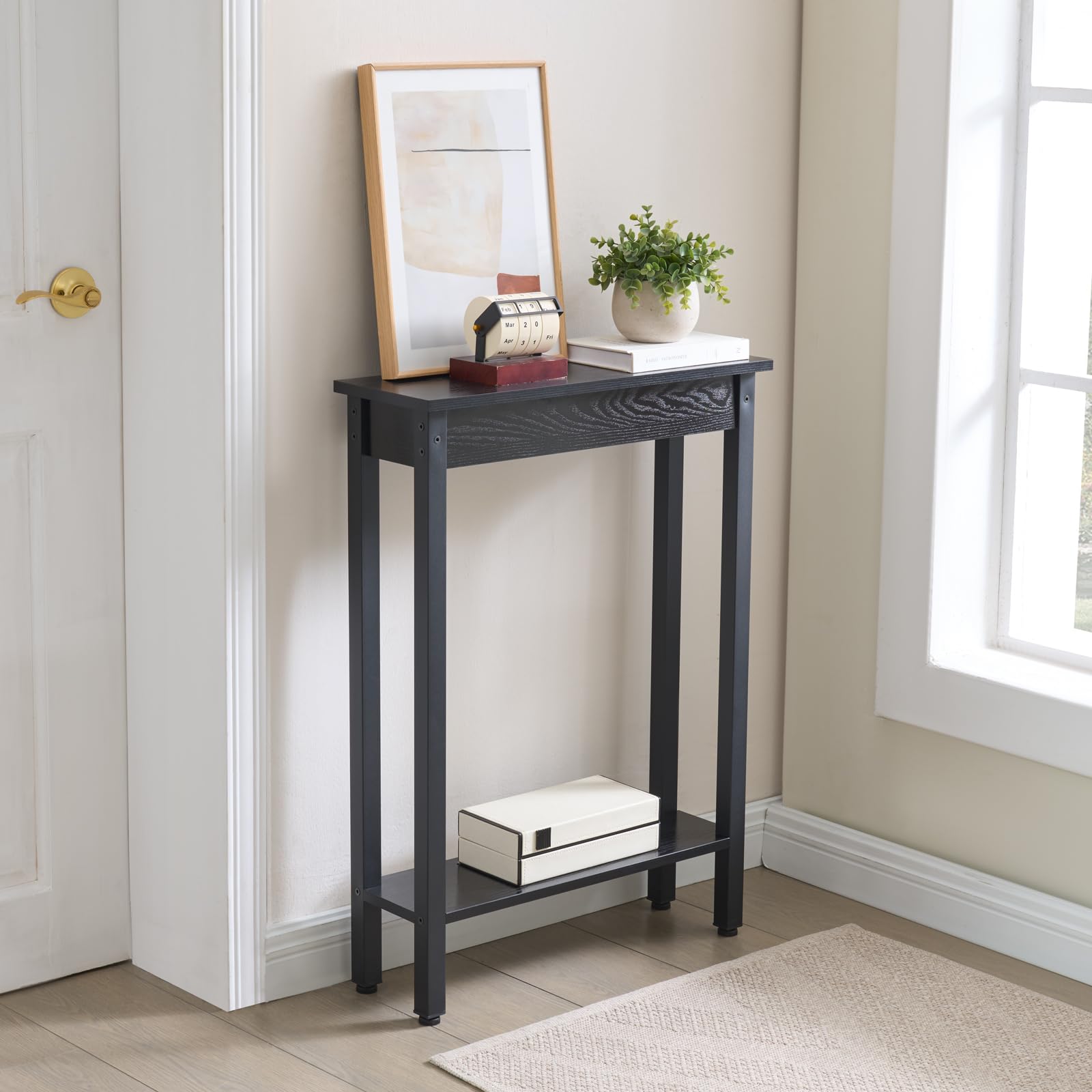 BAMGROW black metal frame console table complements modern interiors.