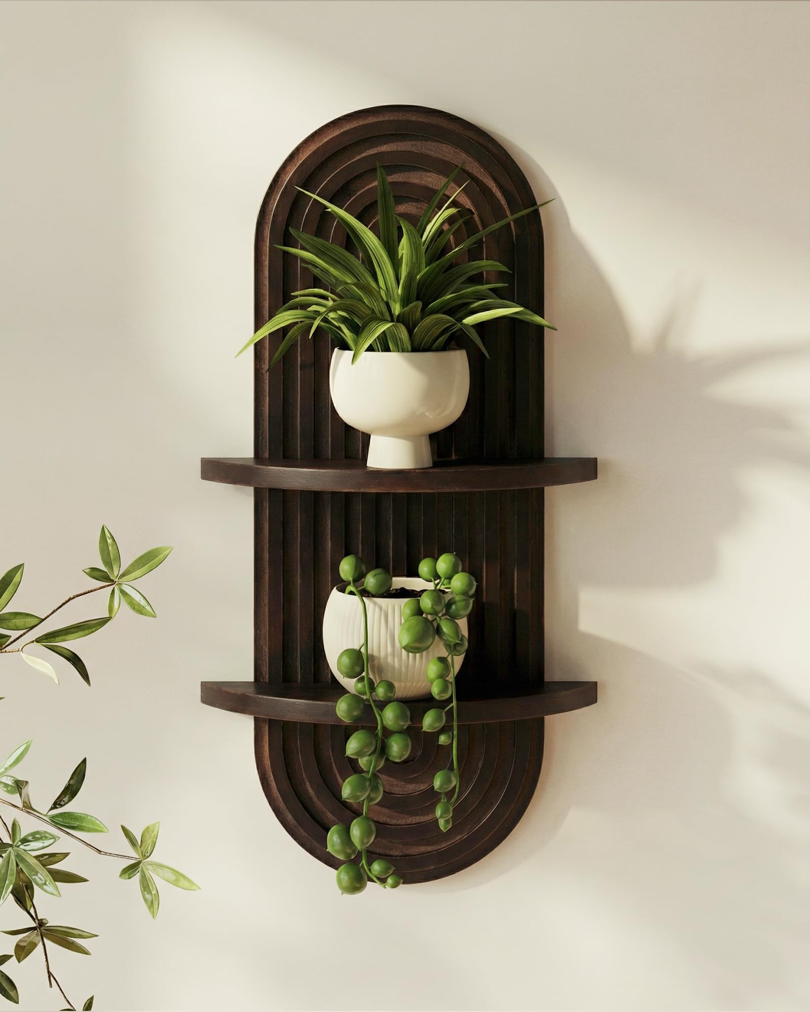 Bamworld boho arched wall decor shelf in walnut, ideal for displaying small plants.