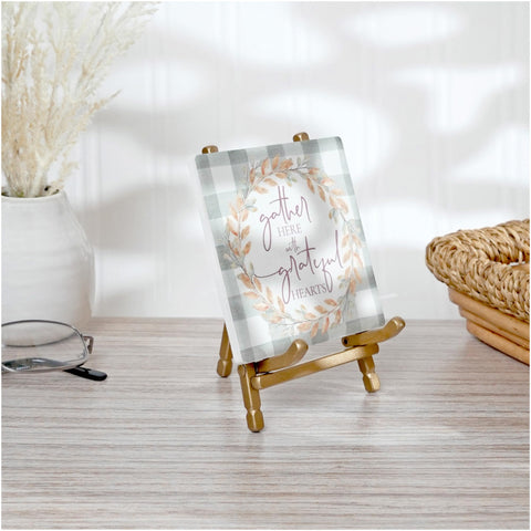 Bard's Satin Gold easel plate-display setup highlights photos at events.