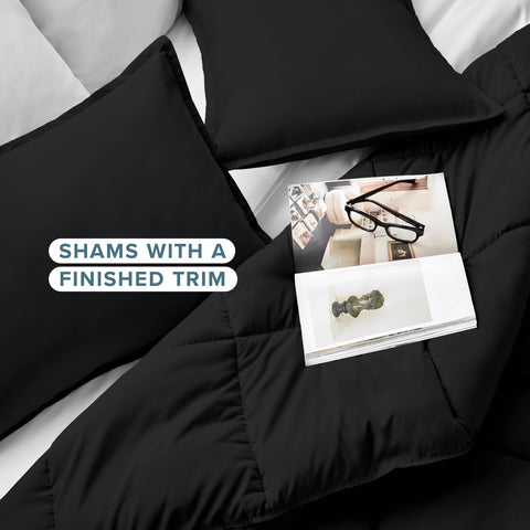 Bare Home black queen comforter draped over bed for a sleek vibe