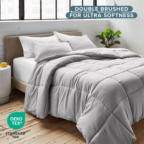 Bare Home comforter on bed in light grey color for all-season warmth.