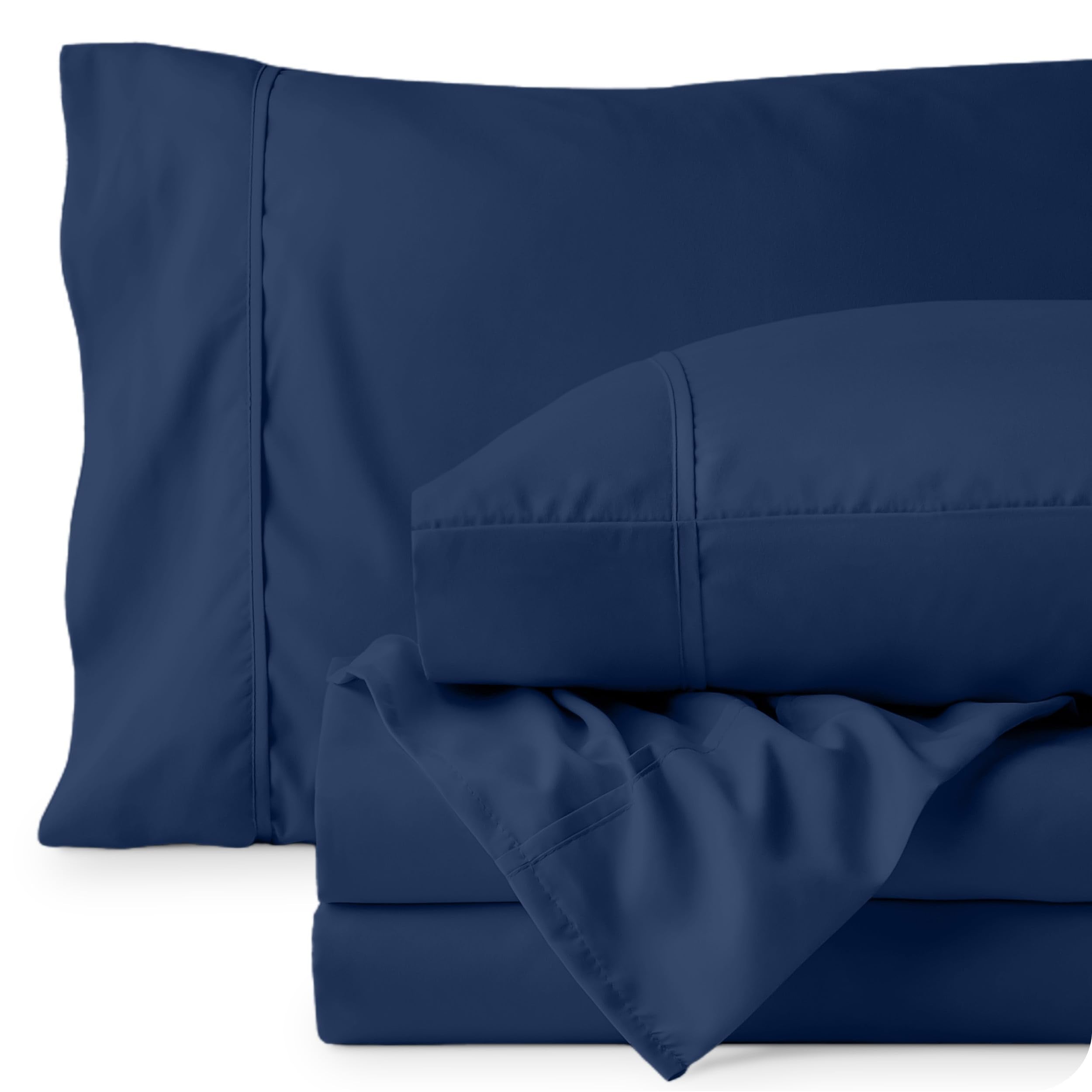 Bare Home dark blue bedding shown as versatile bedroom color accent.