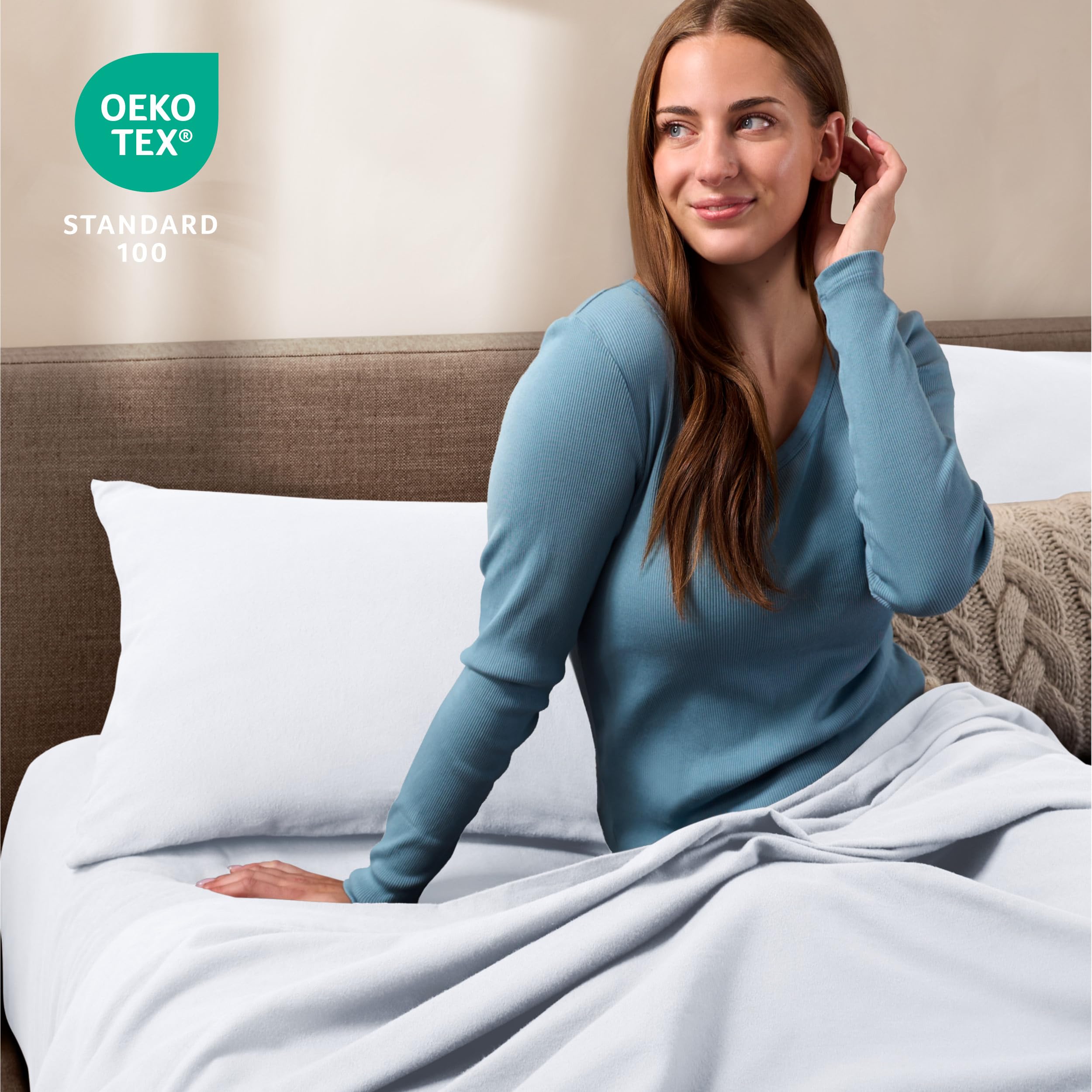 Easy-care Bare Home pillowcase shown ready for machine washing in white.