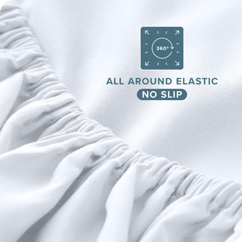 Bare Home king 4-piece set laid out: flat sheet, pillowcases, fitted sheet.