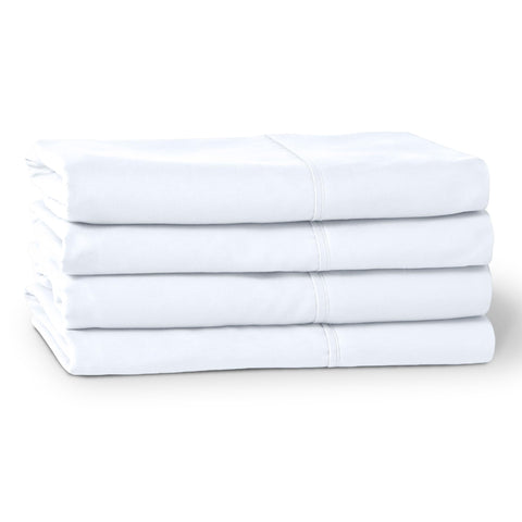 Bare Home white pillowcases shown in a guest bed setup for easy refresh.