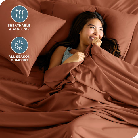 Bare Home terracotta pillowcases add smooth, easy-care bedding.