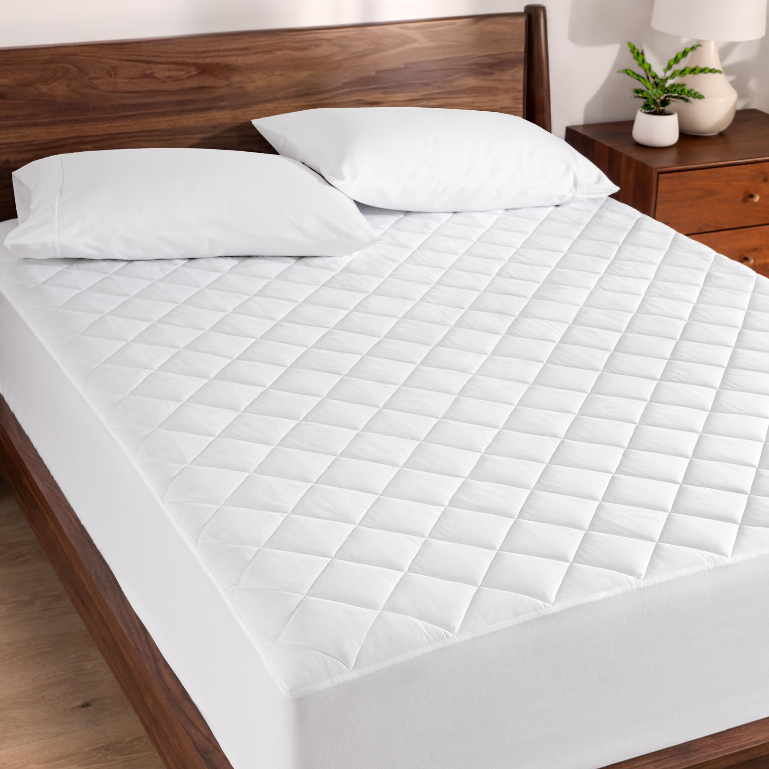 Bare Home quilted fitted mattress pad queen top view highlights plush cotton and breathable comfort.