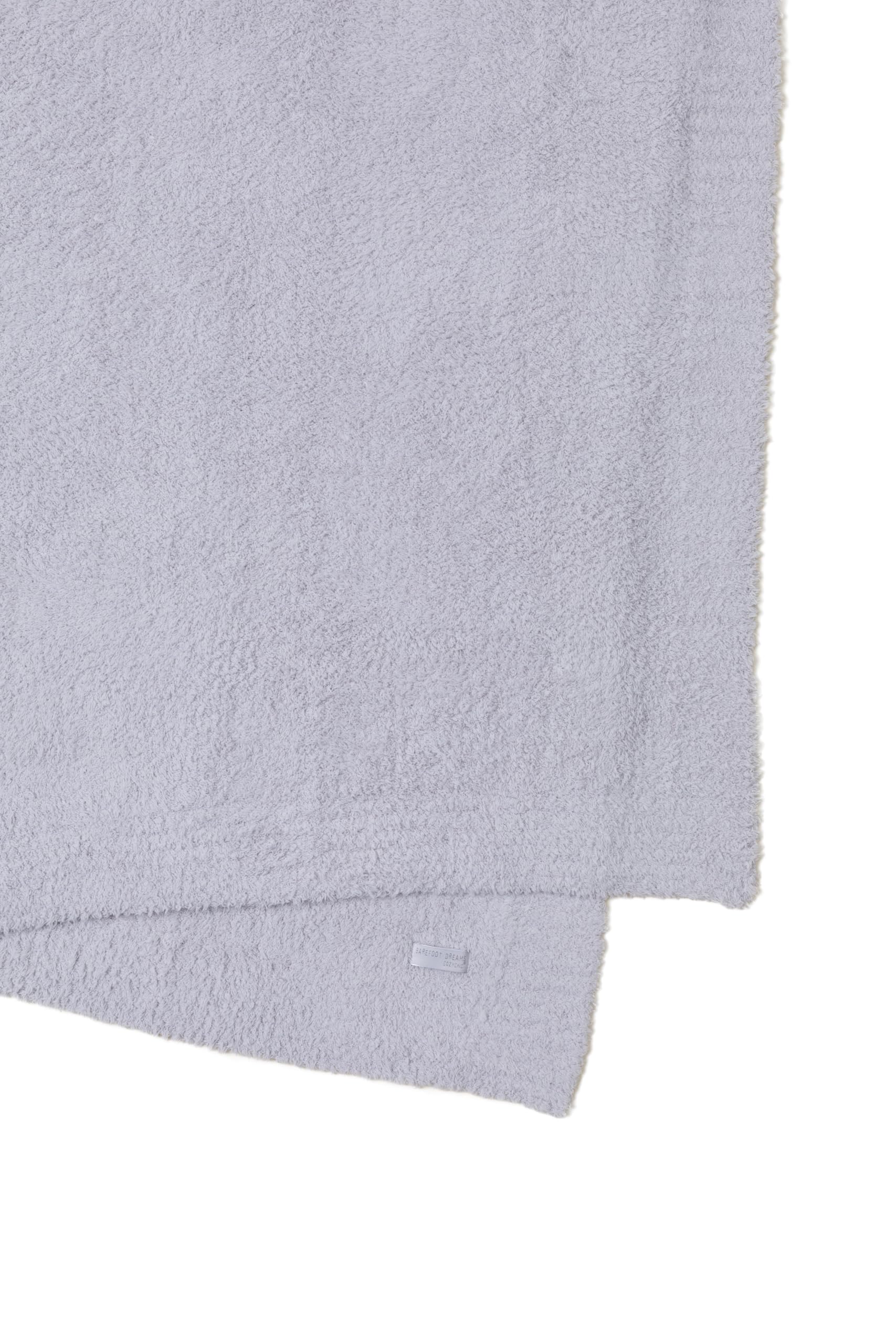 Barefoot Dreams CozyChic Throw closeup fabric showing buttery softness.