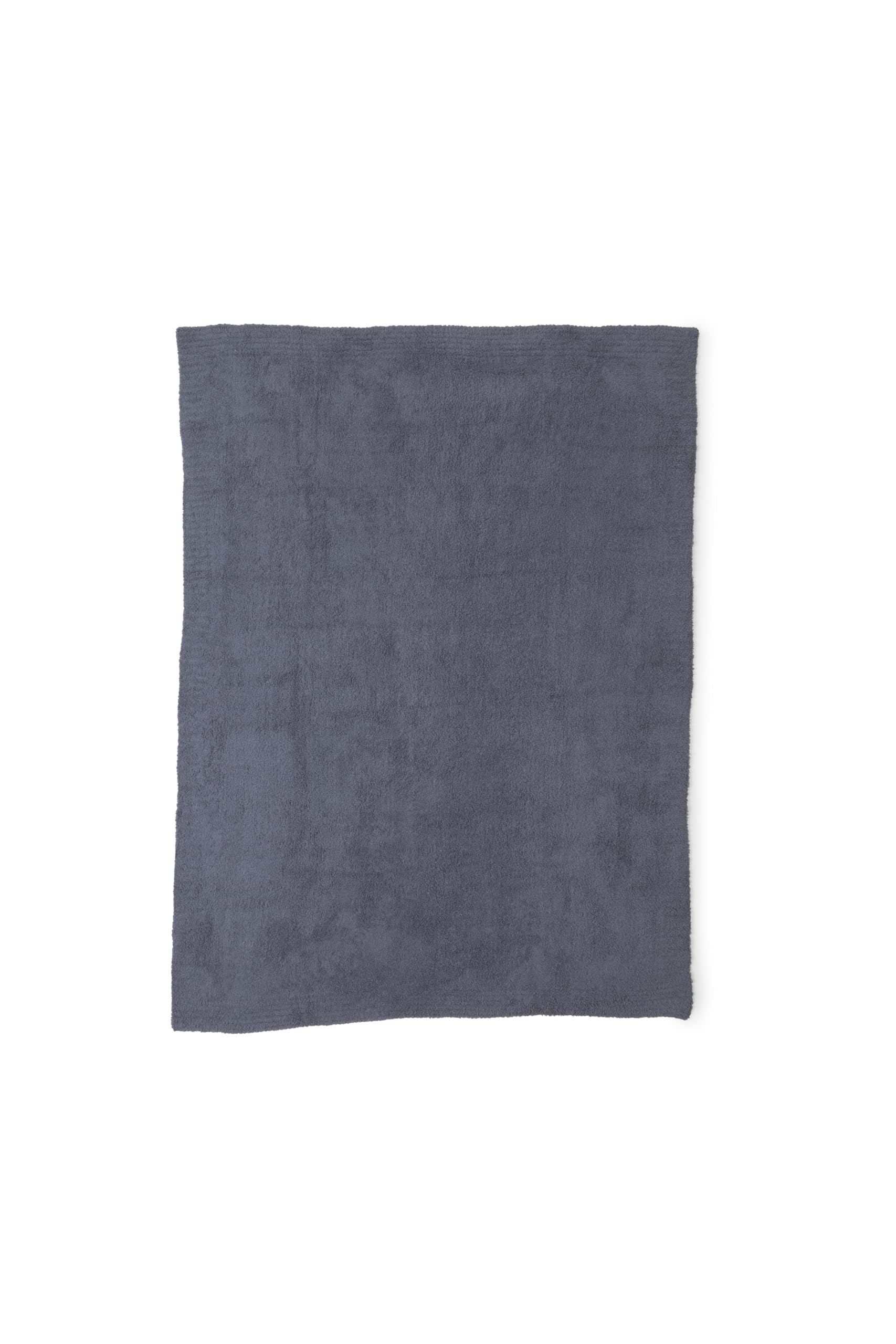 Barefoot Dreams CozyChic Throw Graphite on couch showcases warmth and effortless elegance.