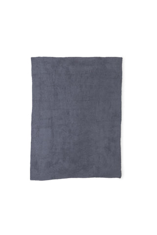 Barefoot Dreams CozyChic Throw Graphite on couch showcases warmth and effortless elegance.