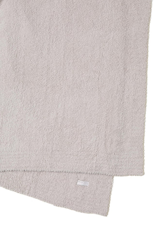 Close-up of Barefoot Dreams CozyChic Throw Stone knit showing soft texture
