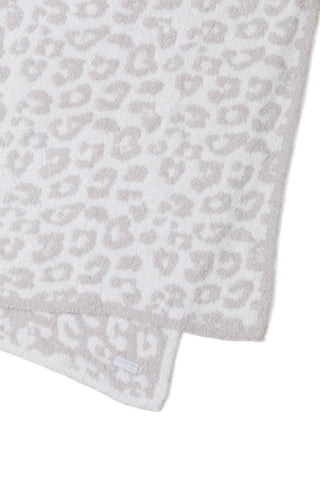 Close-up of jacquard animal print on Barefoot Dreams CozyChic throw