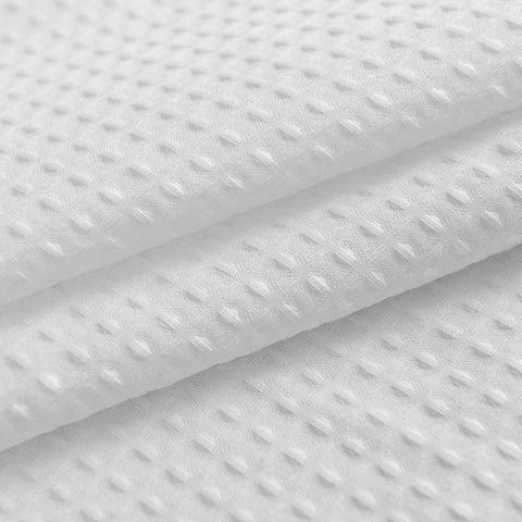 Barossa Design 84-inch curtain showcases a clean white pique pattern