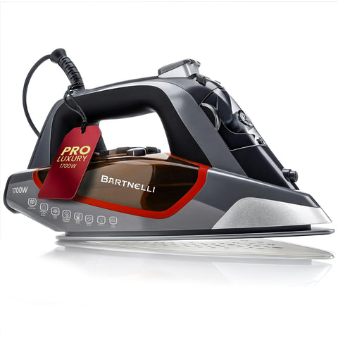 Bartnelli Pro luxury steam iron soleplate gliding smoothly over fabric for flawless press