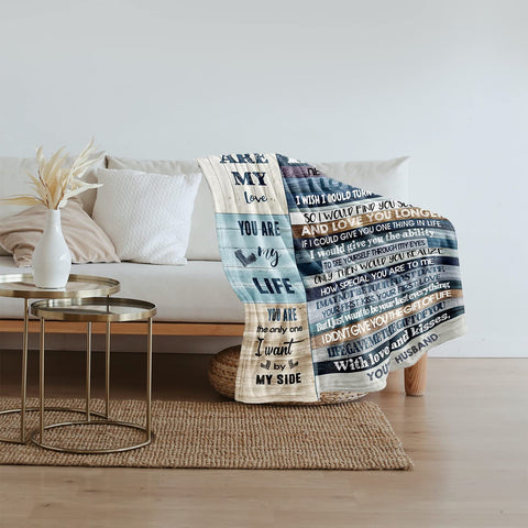 Basao cozy bedroom setup with plush throw decorative accent.