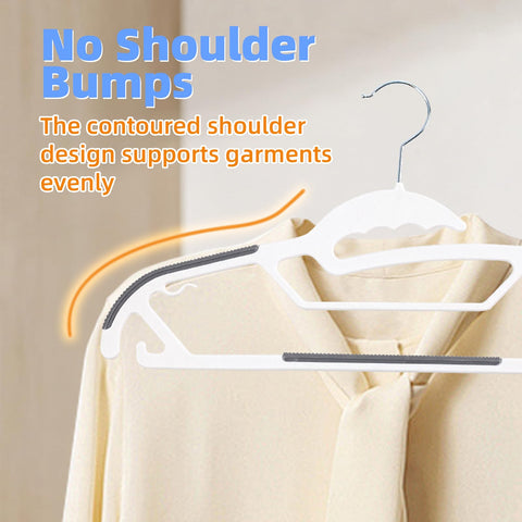 Baseca white hangers ideal for shirts, pants, and coats in a tidy closet.
