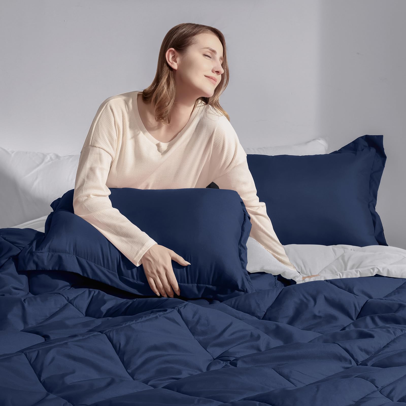 Basic Beyond bedroom styling shot shows elegant decor coordination.