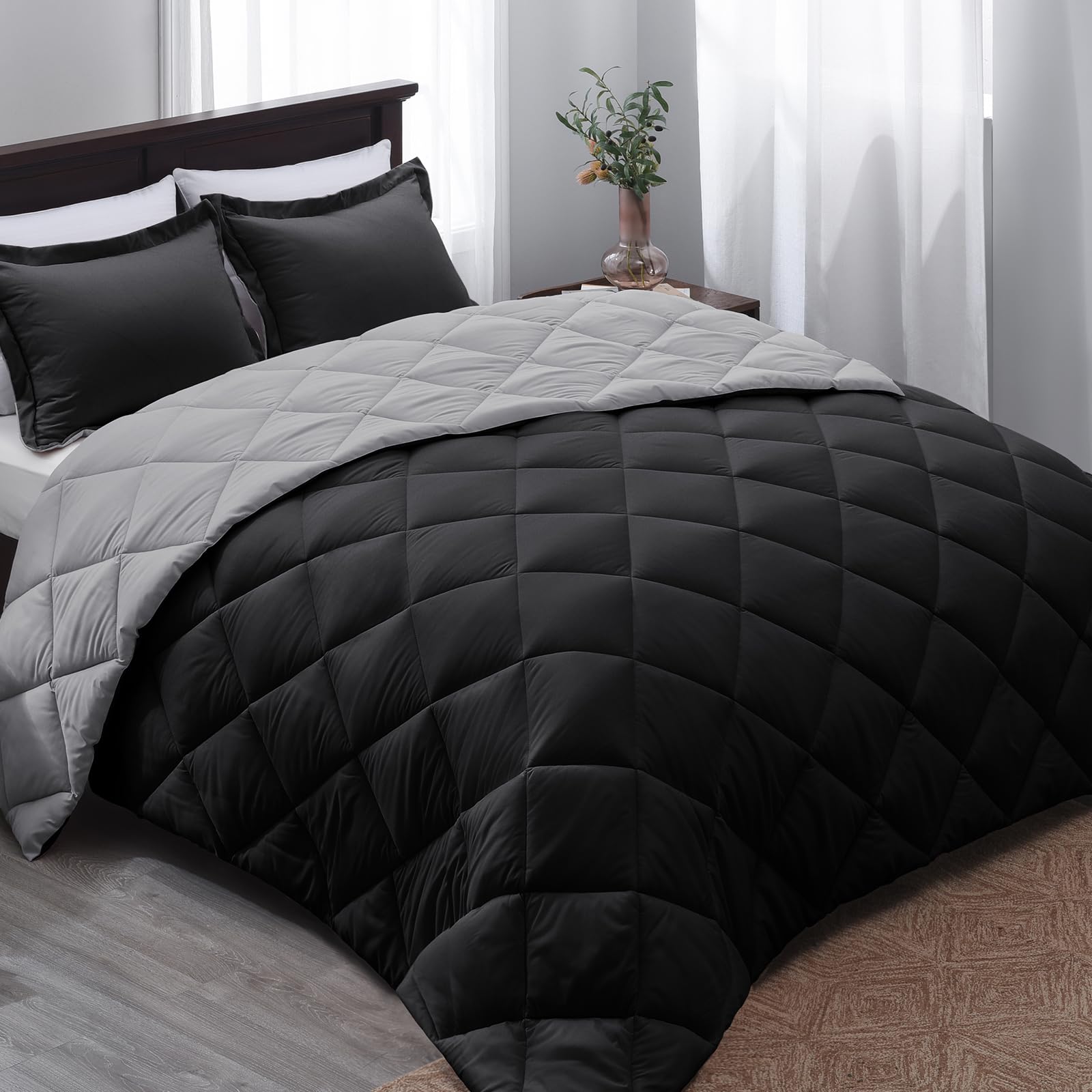 Basic Beyond queen comforter set in black and grey, reversible cover adds versatile styling.