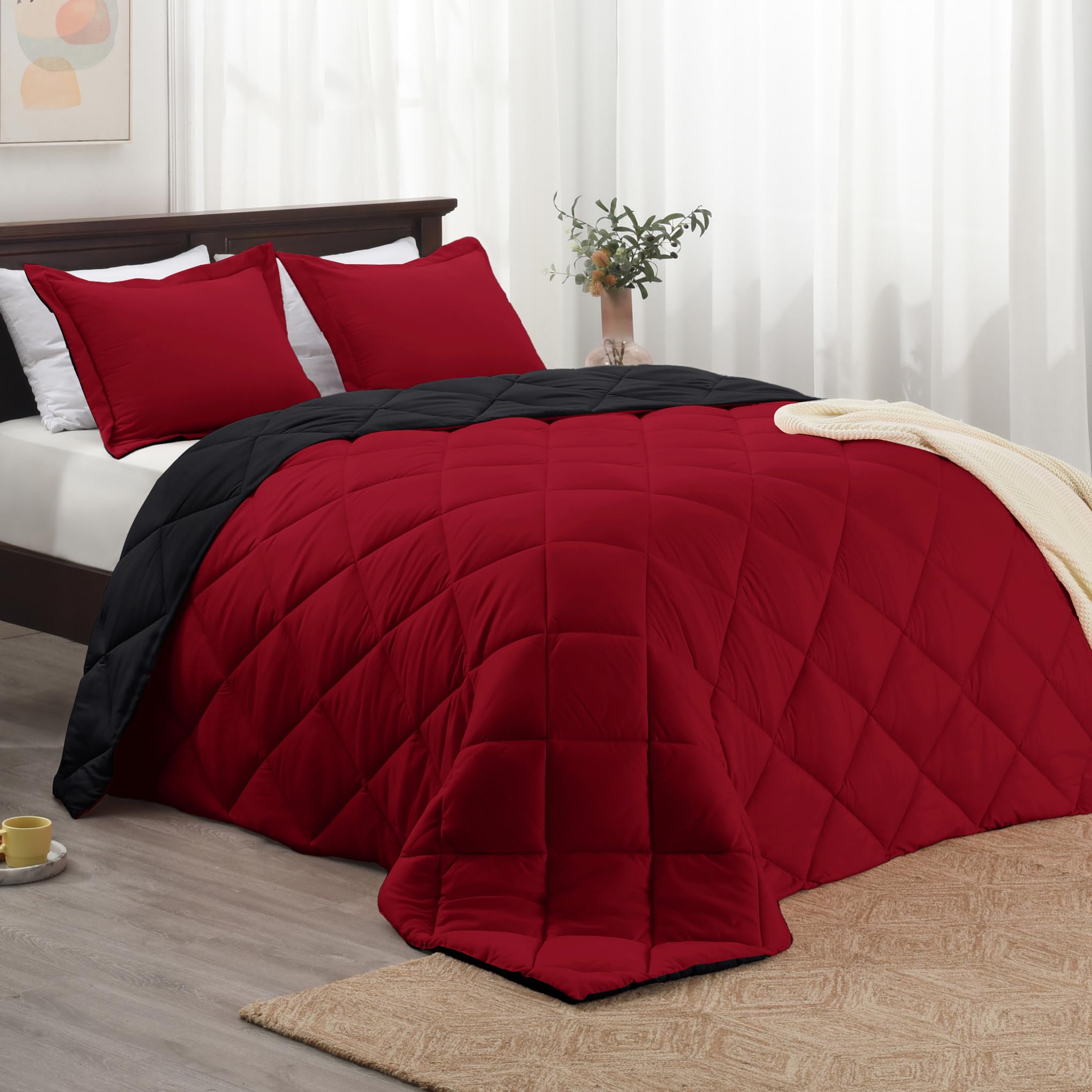 Basic Beyond queen comforter set in red and black on bed, reversible for two stylish looks.