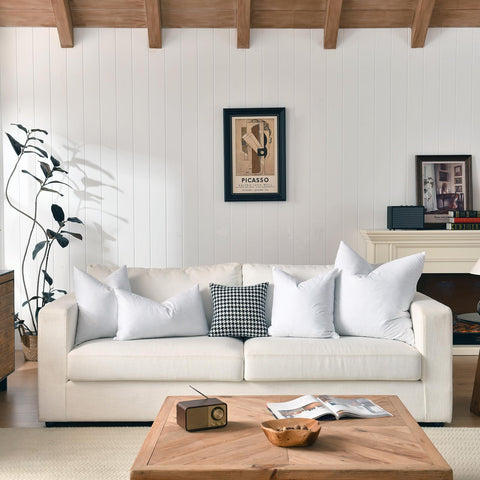 Basic Home odorless goose-down pillow insert in a bedroom keeps a fresh, fragrance-free feel.