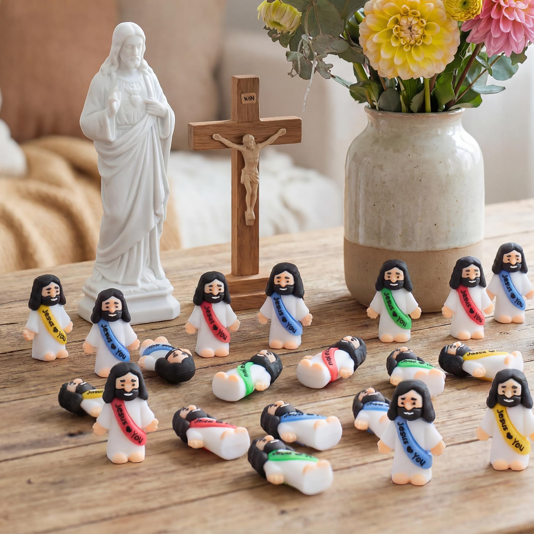 basuwu 215pcs Little Jesus figures in yellow, great for Advent calendars and classroom activities.