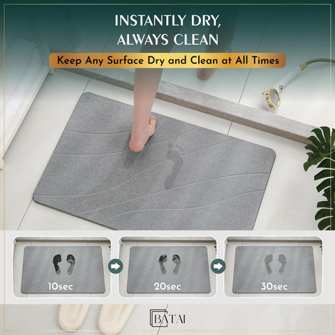 Batai bath mat on floor with non-slip pad for stability.