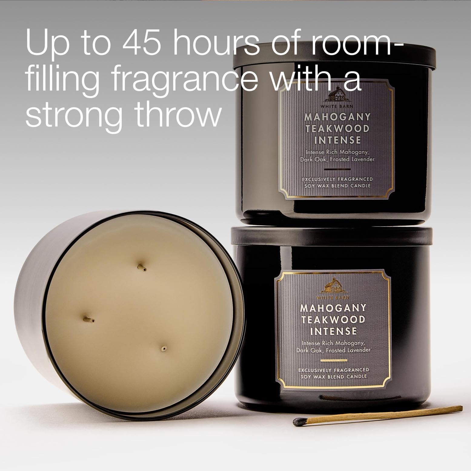 Bath & Body Works Mahogany Teakwood Intense candle in living room setting with warm scent