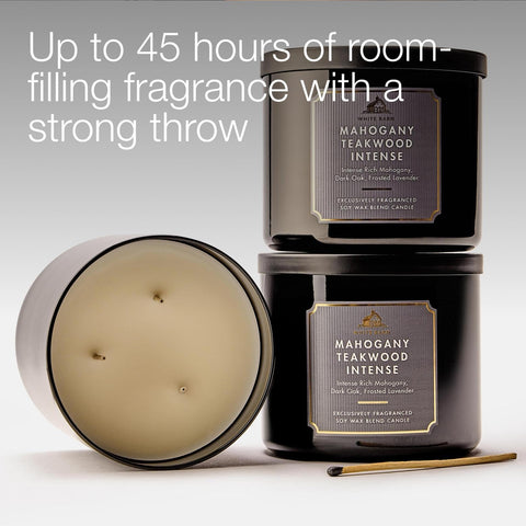 Bath & Body Works Mahogany Teakwood Intense candle in living room setting with warm scent