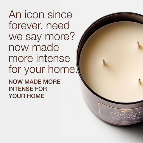 Bath & Body Works Mahogany Teakwood Intense closeup highlights rich wax and three wicks for even burn.