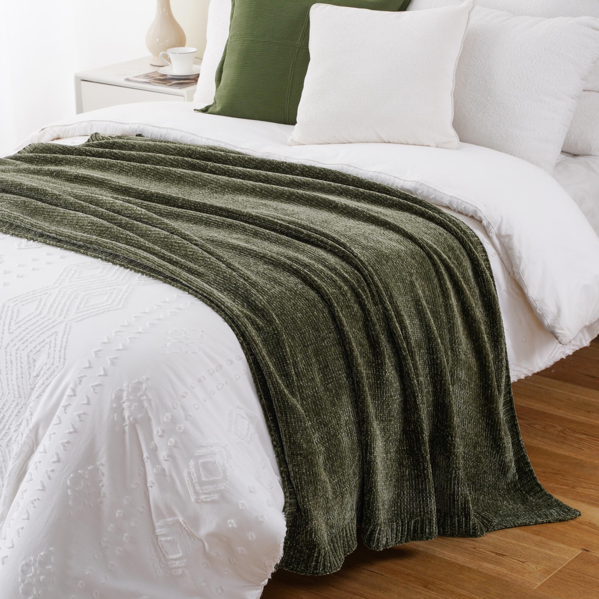 BATTILO HOME throw draped over chair adds cozy ambiance