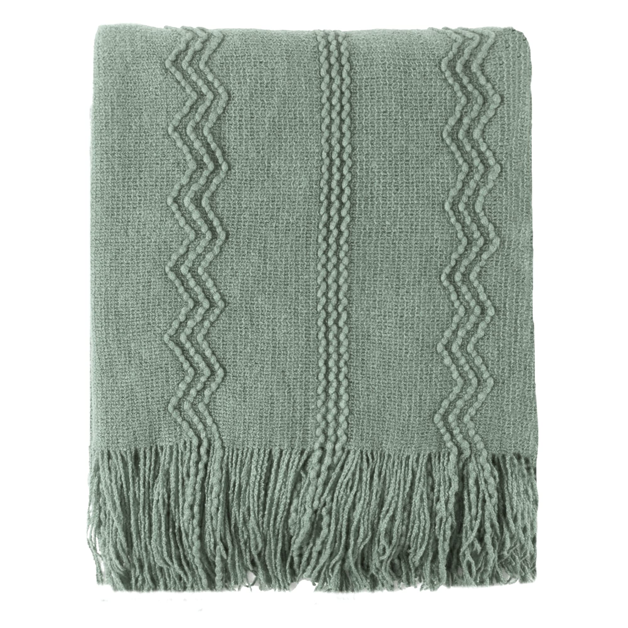 Battilo Home sage green throw on sofa highlights cozy texture for everyday lounging.
