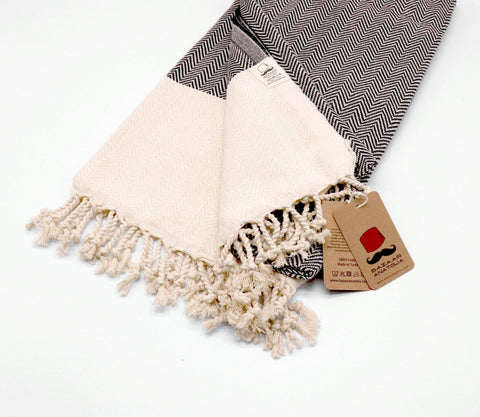 Bazaar Anatolia versatile towel doubles as shawl or travel blanket.