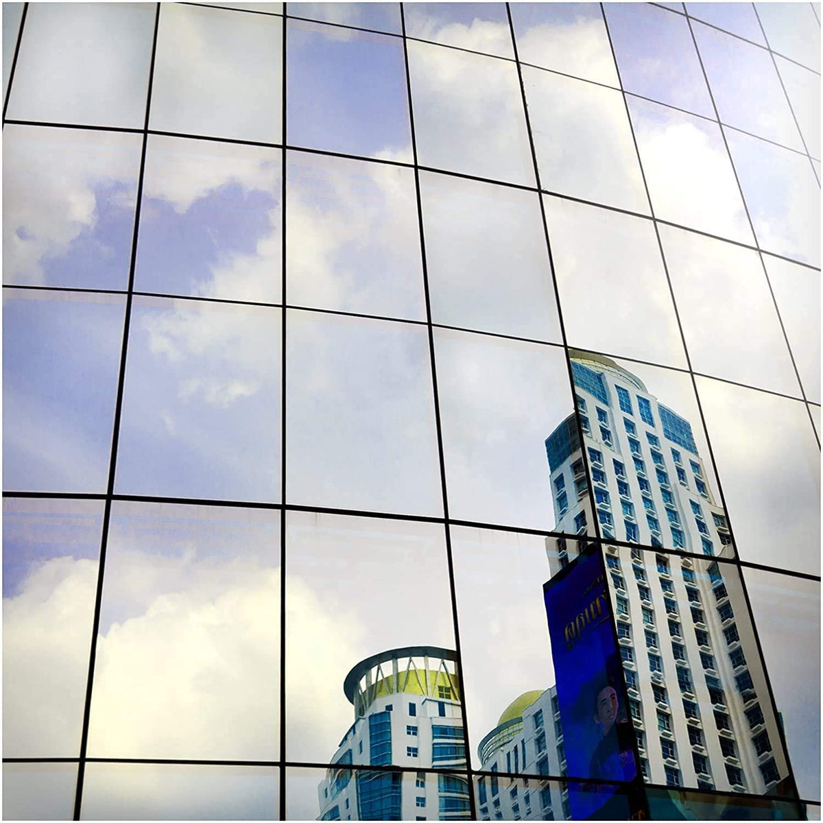 BDF S05 window film demonstrates daytime privacy with mirror-silver finish for glare control.