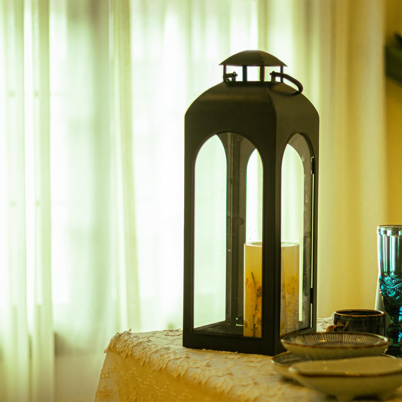 Bdor lanterns set a chic aisle or reception glow for weddings.