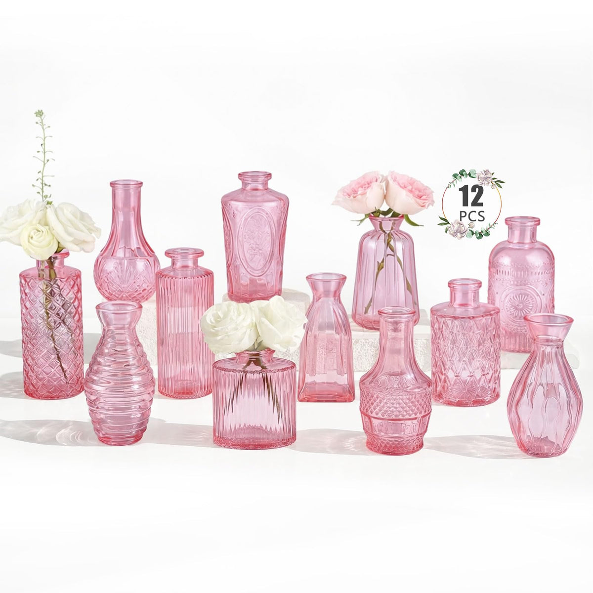 BEAHOT 12-pack pink bud vases with varied shapes for elegant centerpieces.
