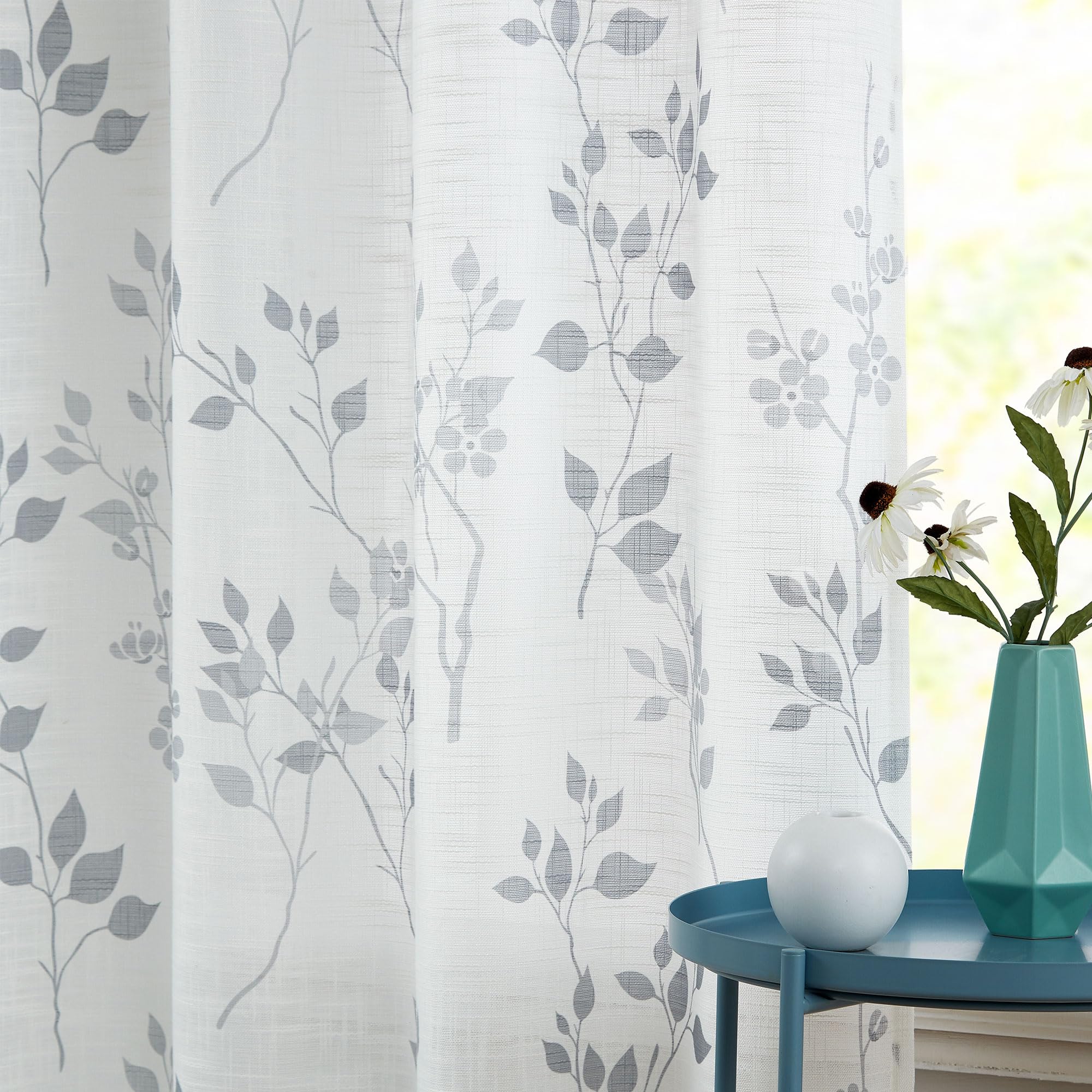 Beauoop floral pattern close-up, linen texture with wrinkle-resistant appearance.
