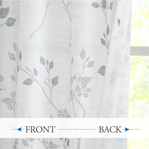 Beauoop window setting with flowing drapes, ideal for relaxing afternoons.