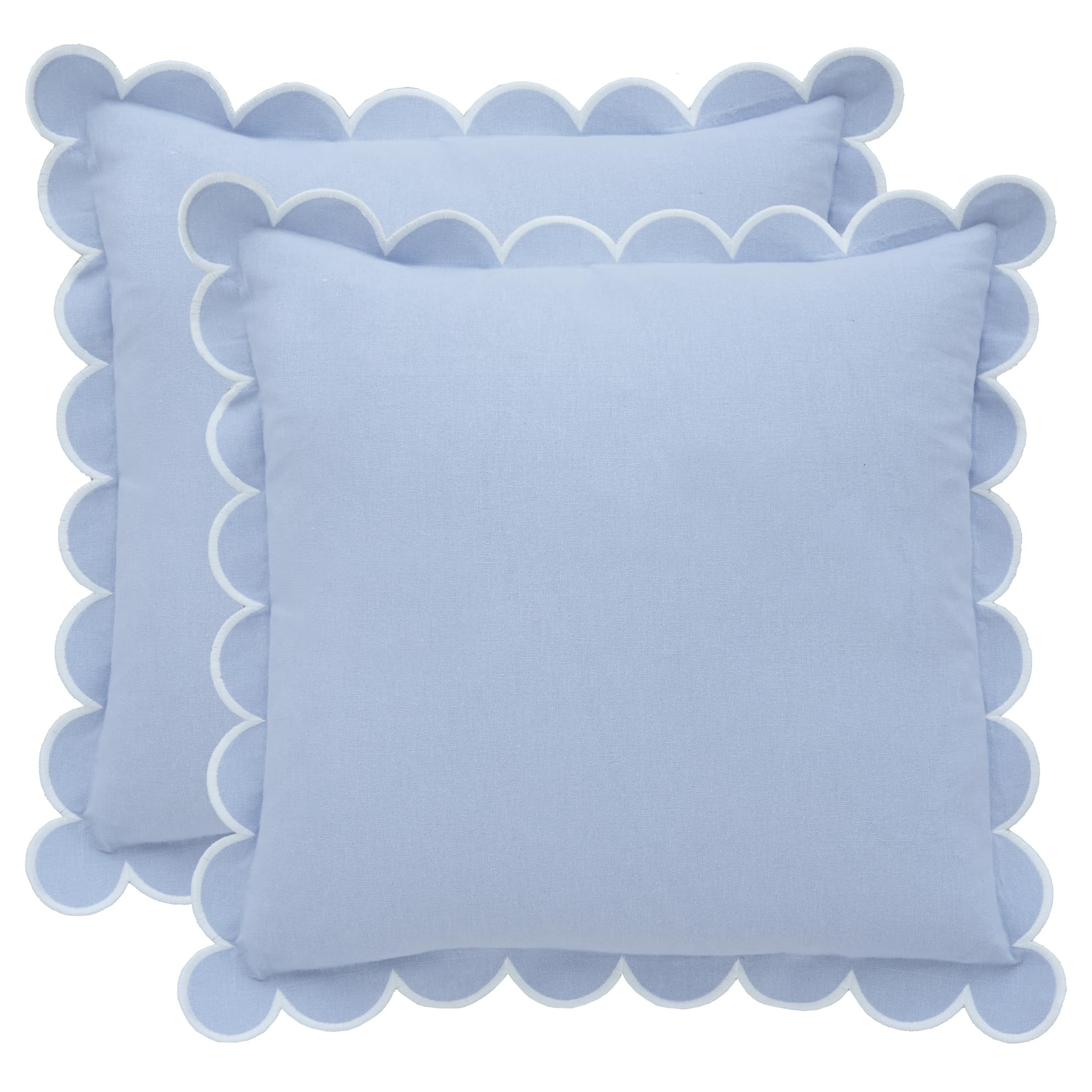 Bebe Bask blue scalloped pillow cover set on sofa adds timeless charm