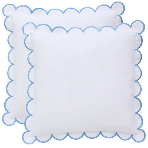 BEBE BASK Margot scalloped pillow cover in white and blue enhances living room décor.