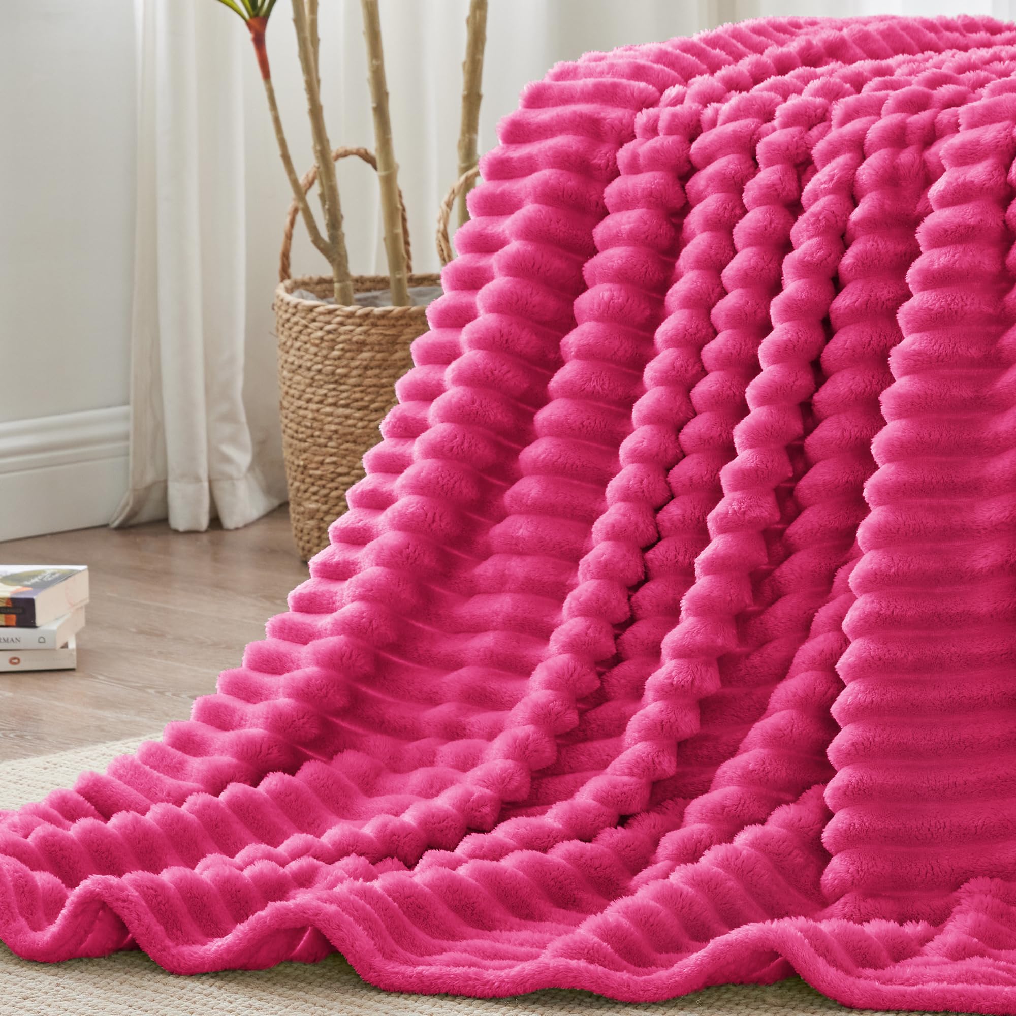 BEDELITE all-seasons blanket on bed or chair, breathable warmth.