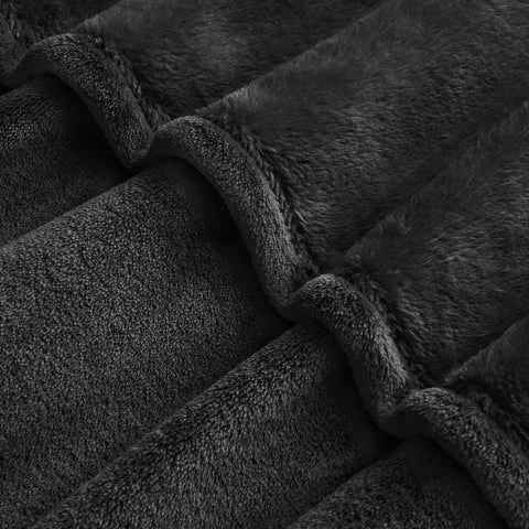 BEDELITE king-size blanket spread across bed demonstrates generous size