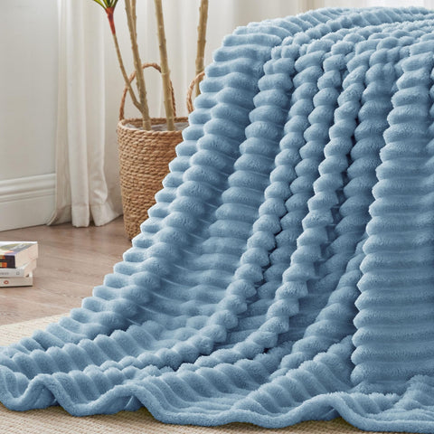 BEDELITE blanket in camping setup offers travel warmth