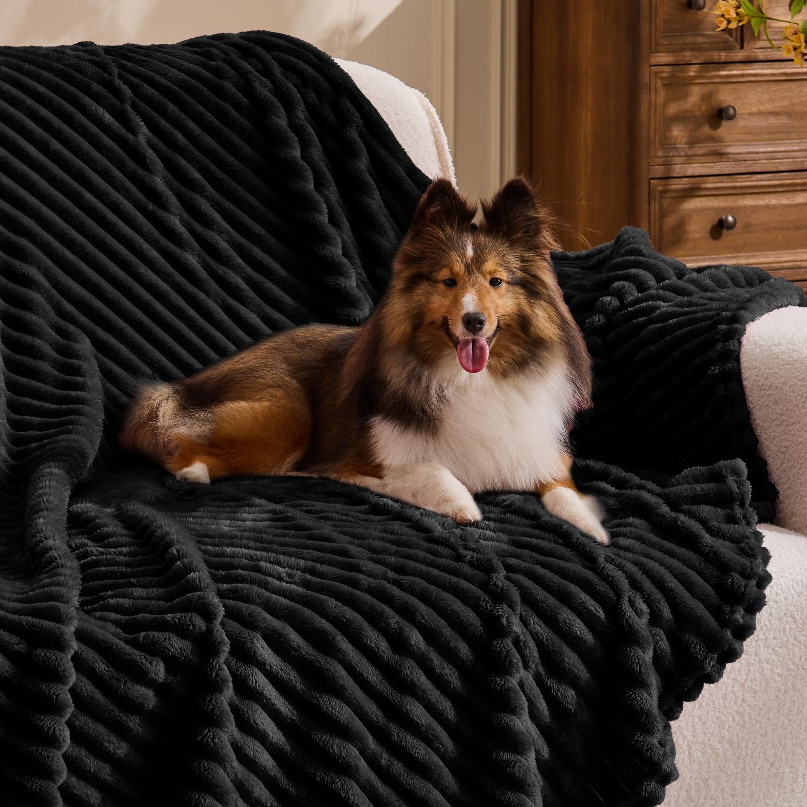 BEDELITE cozy throw draped over bed emphasizes lightweight warmth for all seasons